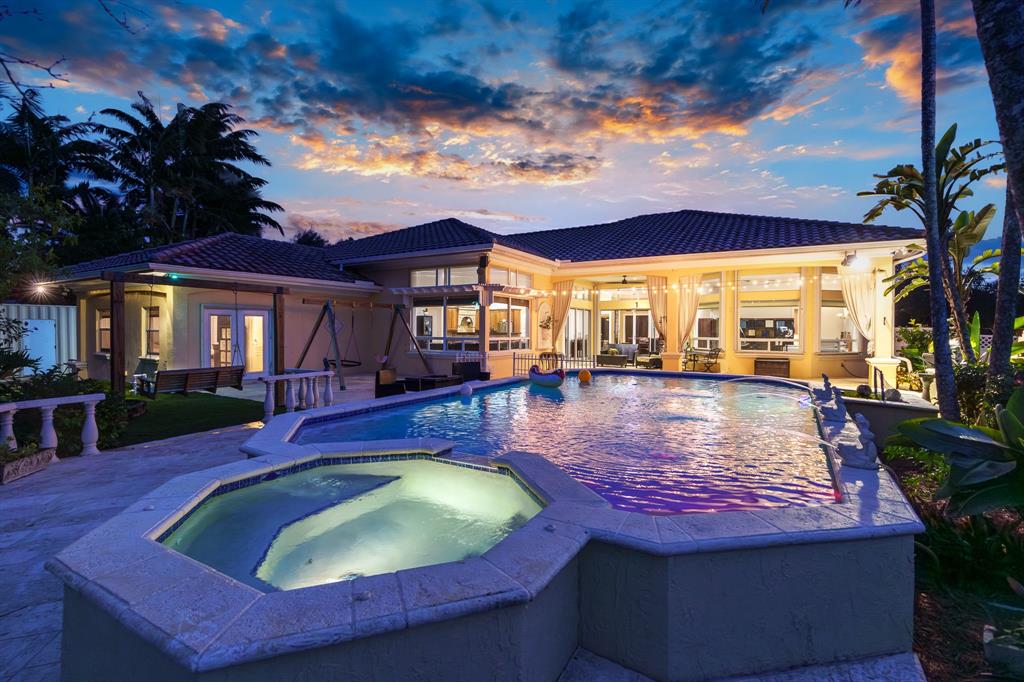 5973 Southwest 54th Court Davie, FL 33314 - Photo 48 of 49 a view of a house with swimming pool and sitting area