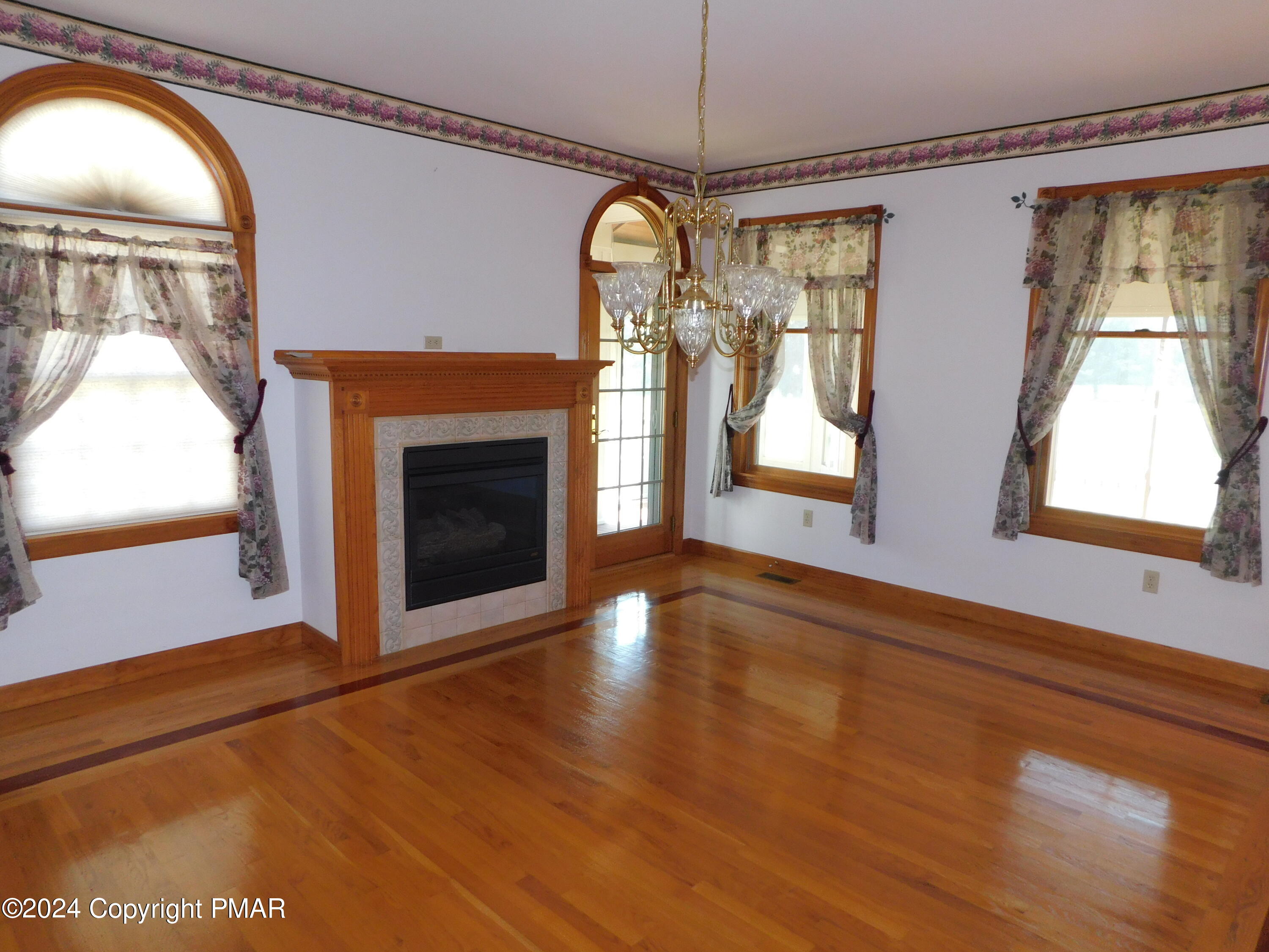 1258 Beaver Valley Road Stroudsburg, PA 18360 - Photo 14 of 65 a view of an empty room with window and wooden floor