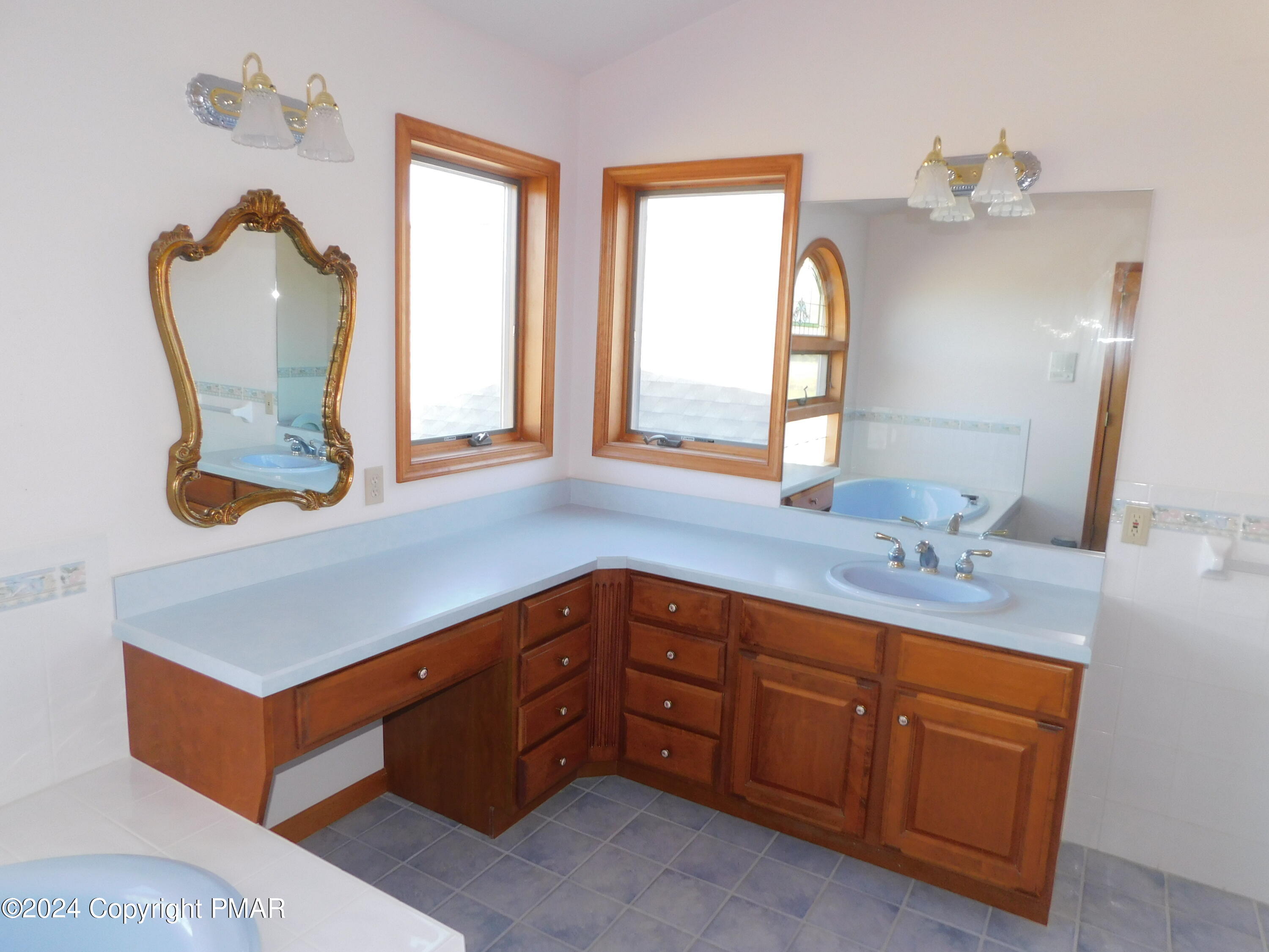 1258 Beaver Valley Road Stroudsburg, PA 18360 - Photo 24 of 65 a bathroom with a sink a vanity and a mirror