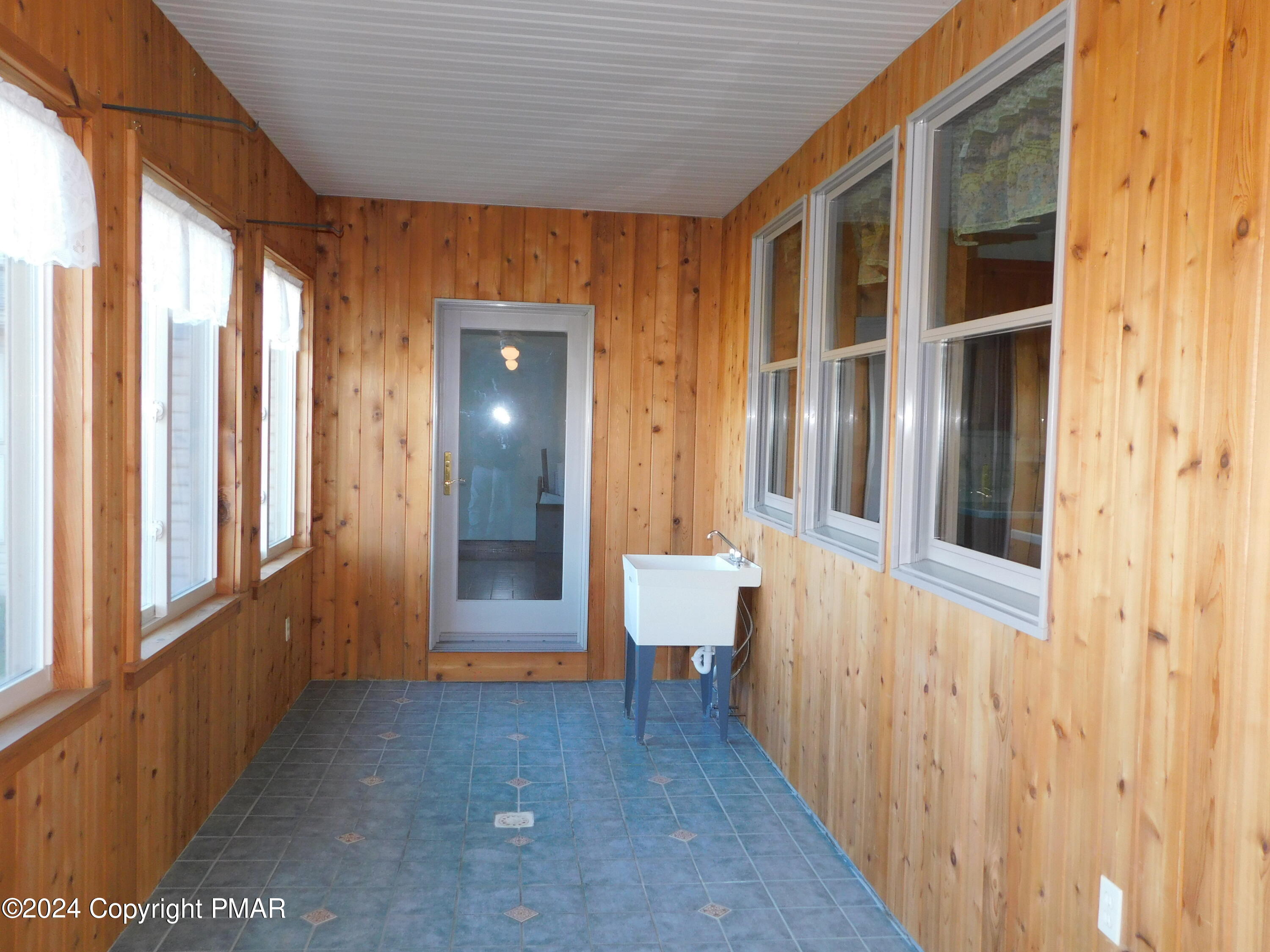 1258 Beaver Valley Road Stroudsburg, PA 18360 - Photo 38 of 65 a view of a hallway with wooden floor and staircase