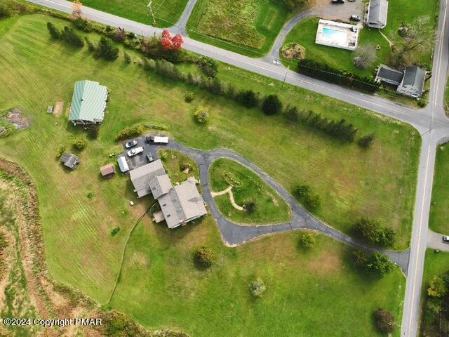 1258 Beaver Valley Road Stroudsburg, PA 18360 - Photo 63 of 65 an aerial view of a house with a yard swimming pool and outdoor seating