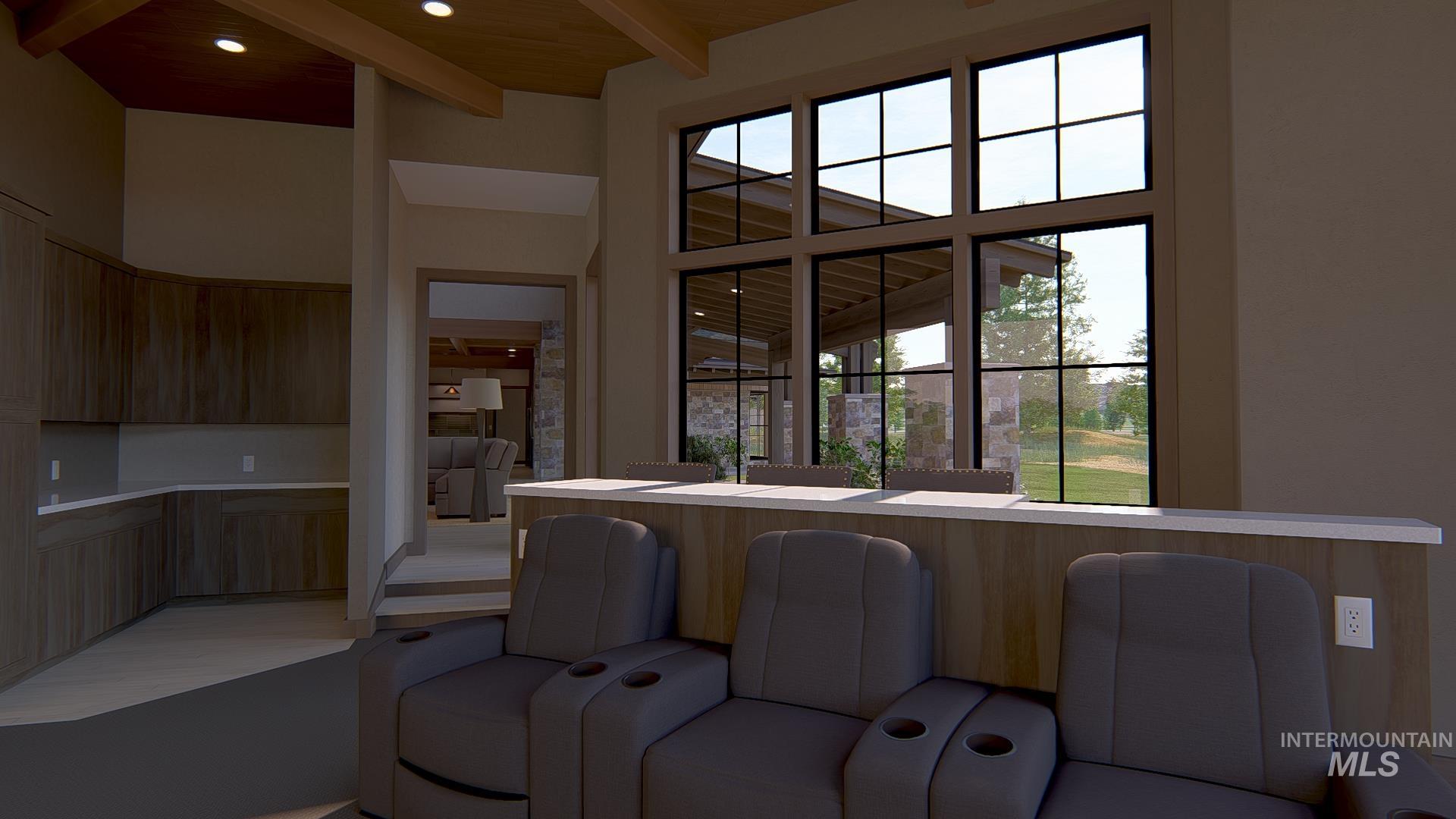 212 Rawhide Loop McCall, ID 83638 - Photo 27 of 28 Kitchen with open floor plan, modern cabinets, beamed ceiling, plenty of natural light, and a high ceiling