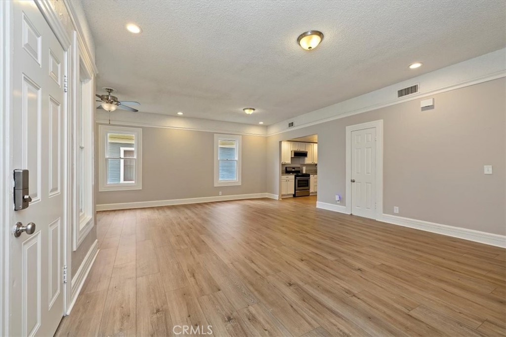 4336 6th Street Riverside, CA 92501 - Photo 3 of 19 a view of empty room with wooden floor