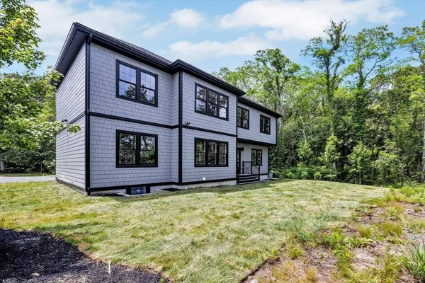 a house view with a garden space