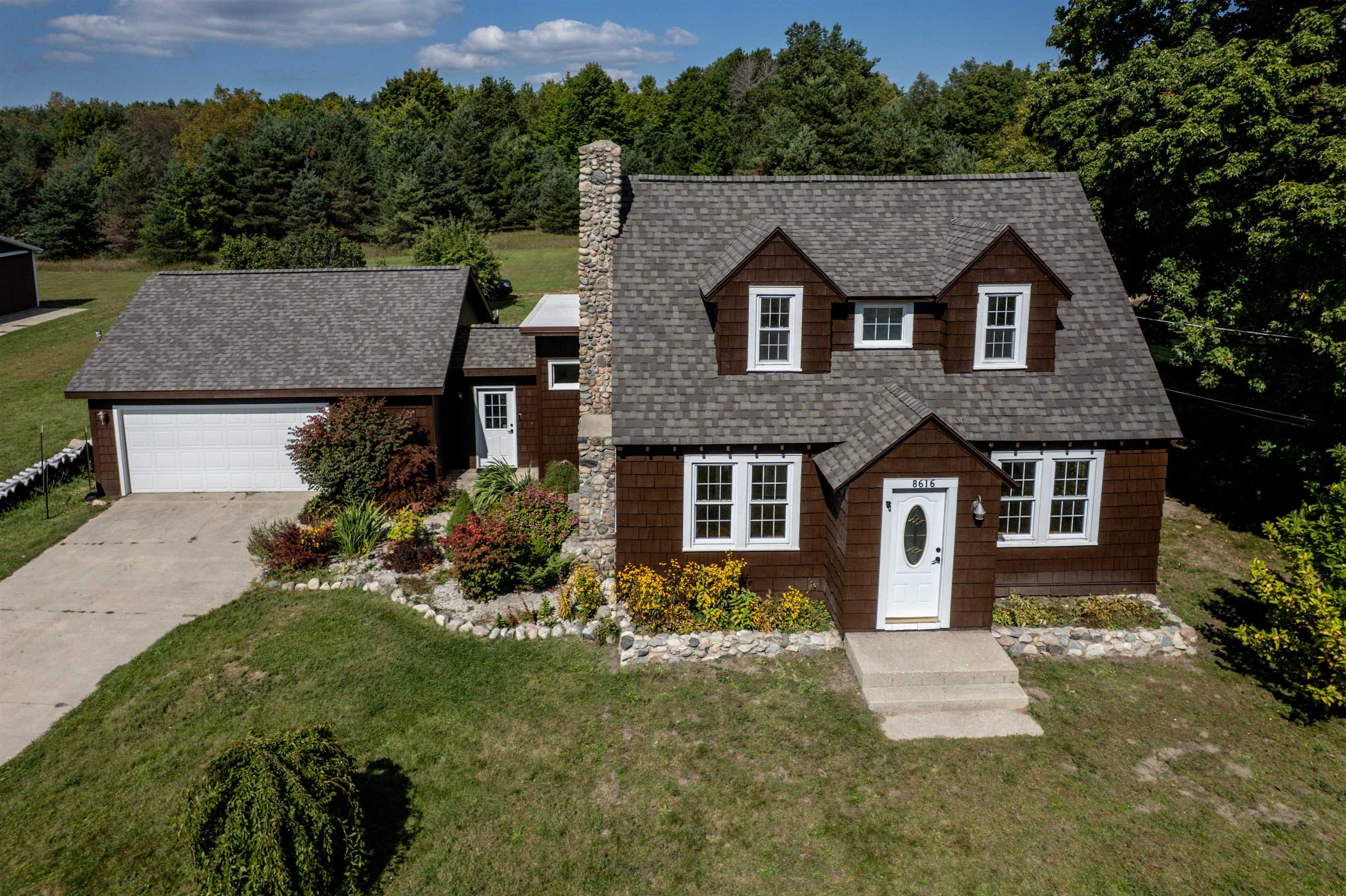 8616 Cedar Run Road Traverse City, MI 49684 - Photo 1 of 59