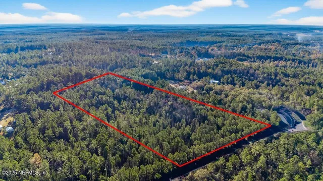 a view of ocean view with large trees