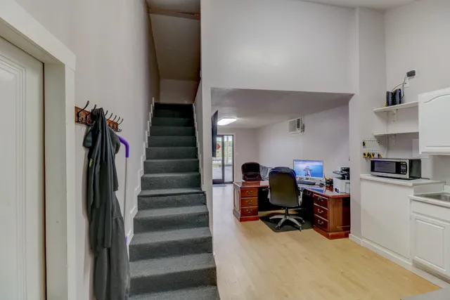 a view of a car in front of a house