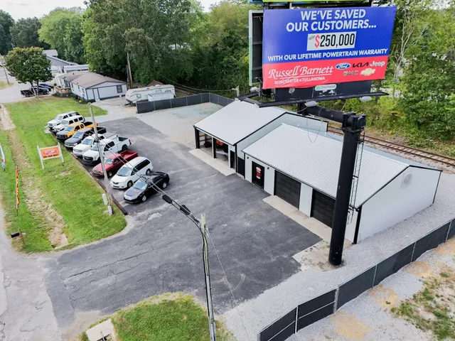a view of a chairs and table in the patio