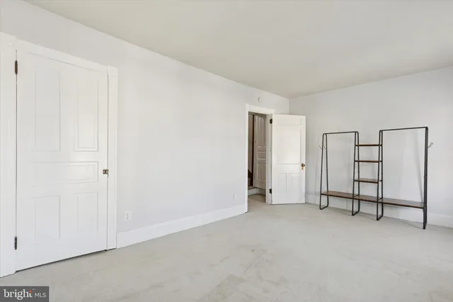 a bedroom with furniture and a couch