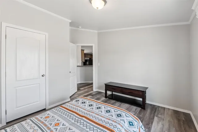 a bathroom with a sink toilet tub and shower