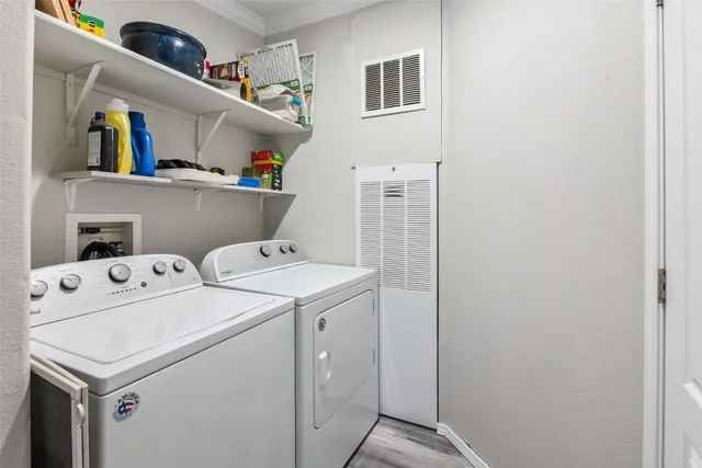 a utility room with dryer and washer