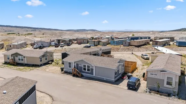 an aerial view of a house with a garden