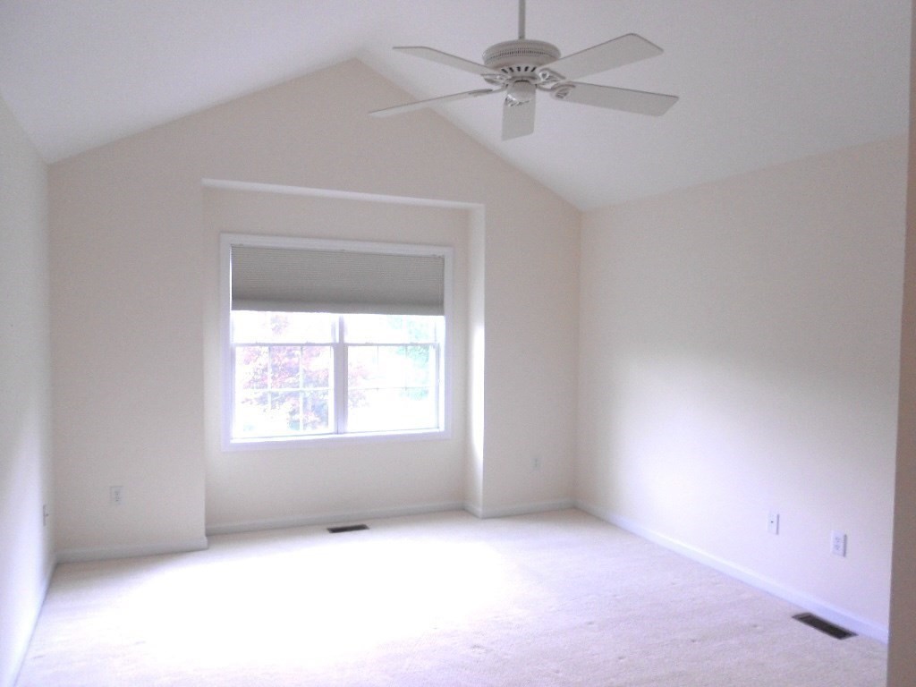 141 Lordvale Boulevard, Unit 141 Grafton, MA 01536 - Photo 17 of 23 an empty room with a window