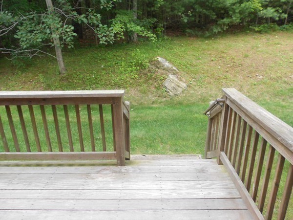 141 Lordvale Boulevard, Unit 141 Grafton, MA 01536 - Photo 22 of 23 a view of a balcony with lake