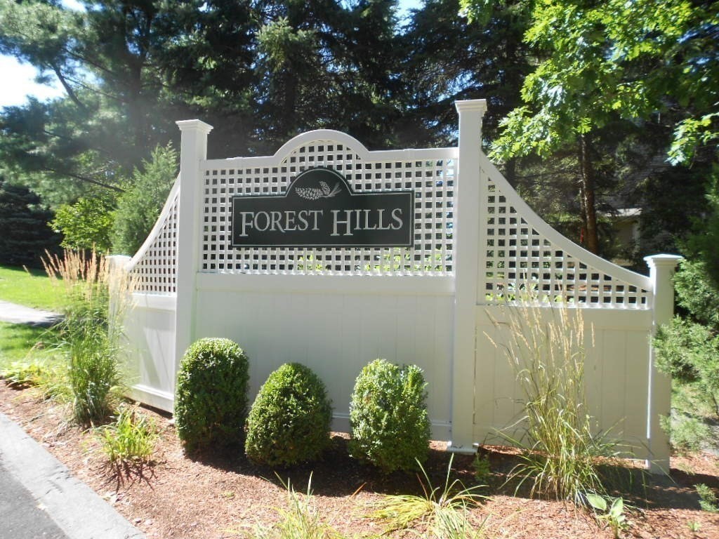 141 Lordvale Boulevard, Unit 141 Grafton, MA 01536 - Photo 23 of 23 a view of a bench in the garden