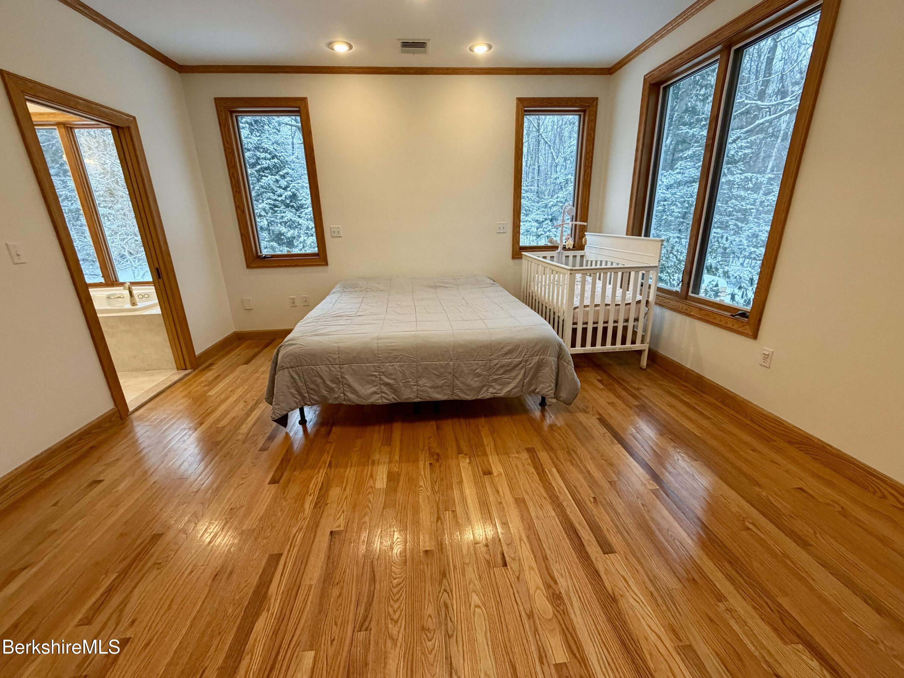 7 Poirot Road Florida, MA 01247 - Photo 33 of 57 a bedroom with a bed and a window