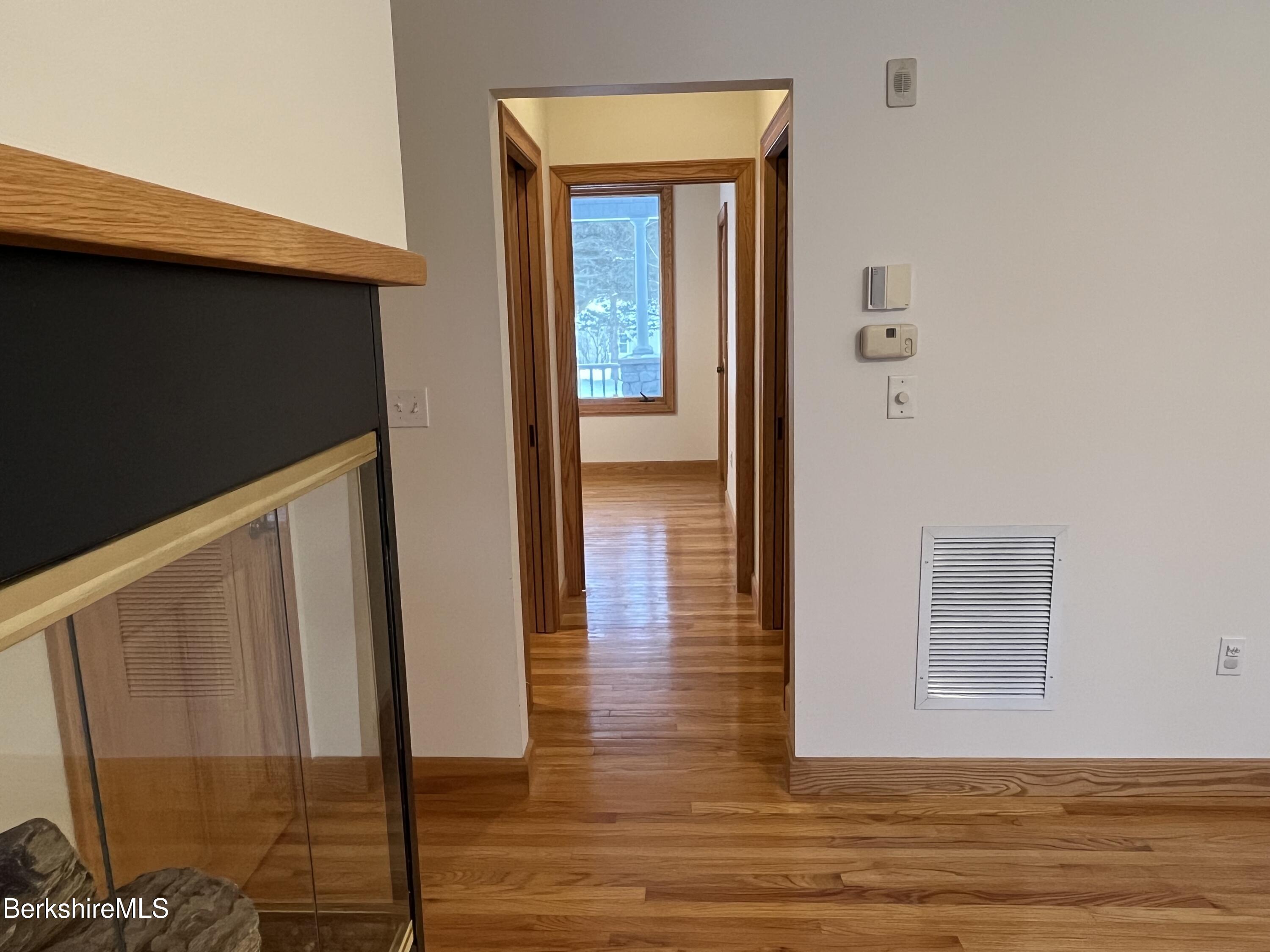 7 Poirot Road Florida, MA 01247 - Photo 35 of 57 a view of hallway with wooden floor