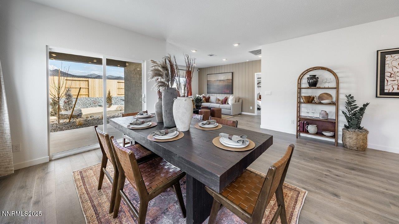 612 Union Road, Unit LOT #64 Dayton, NV 89403 - Photo 11 of 25 a view of a dining room with furniture and wooden floor