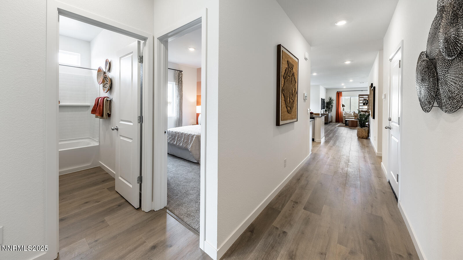 612 Union Road, Unit LOT #64 Dayton, NV 89403 - Photo 2 of 25 a view of a hallway with wooden floor and staircase