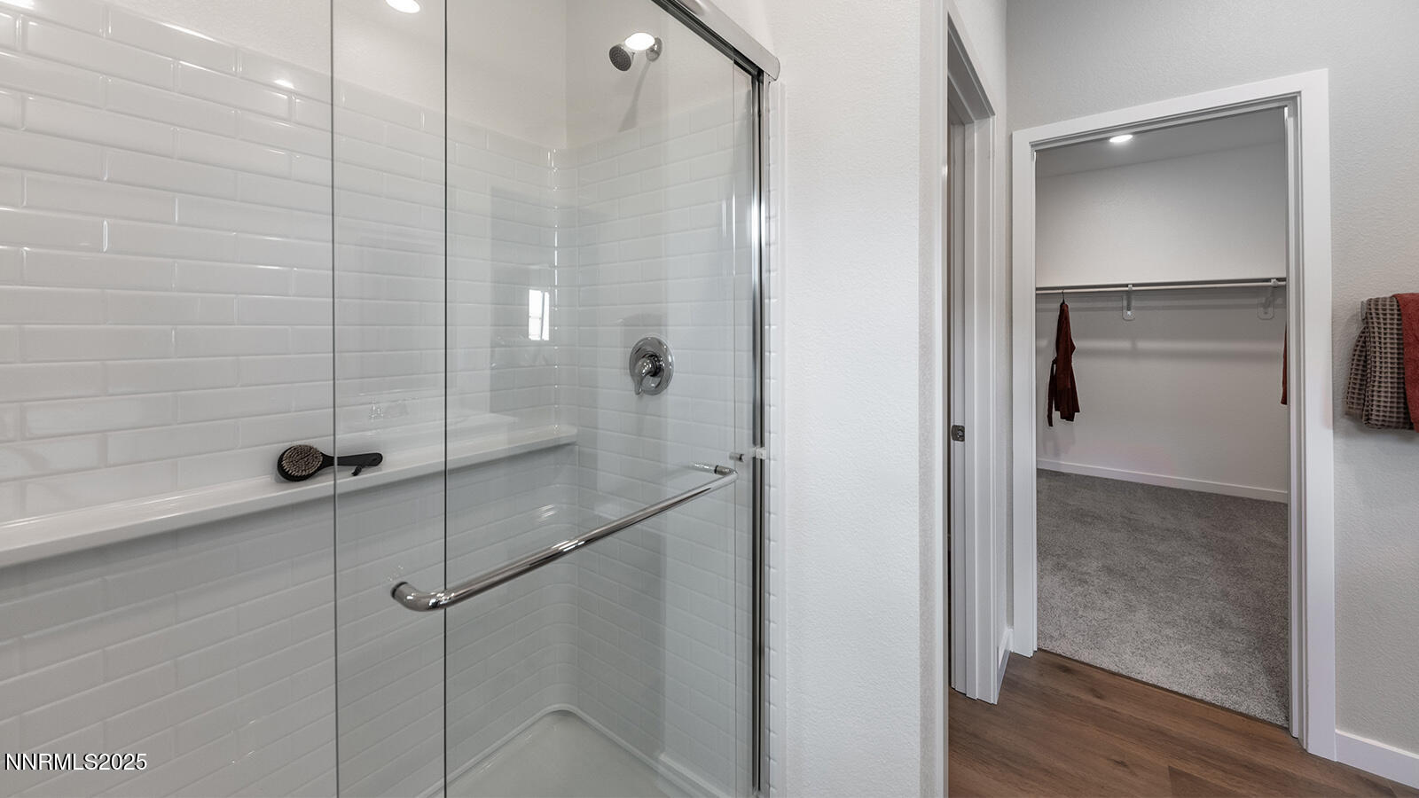 612 Union Road, Unit LOT #64 Dayton, NV 89403 - Photo 21 of 25 a bathroom with a shower and a glass door