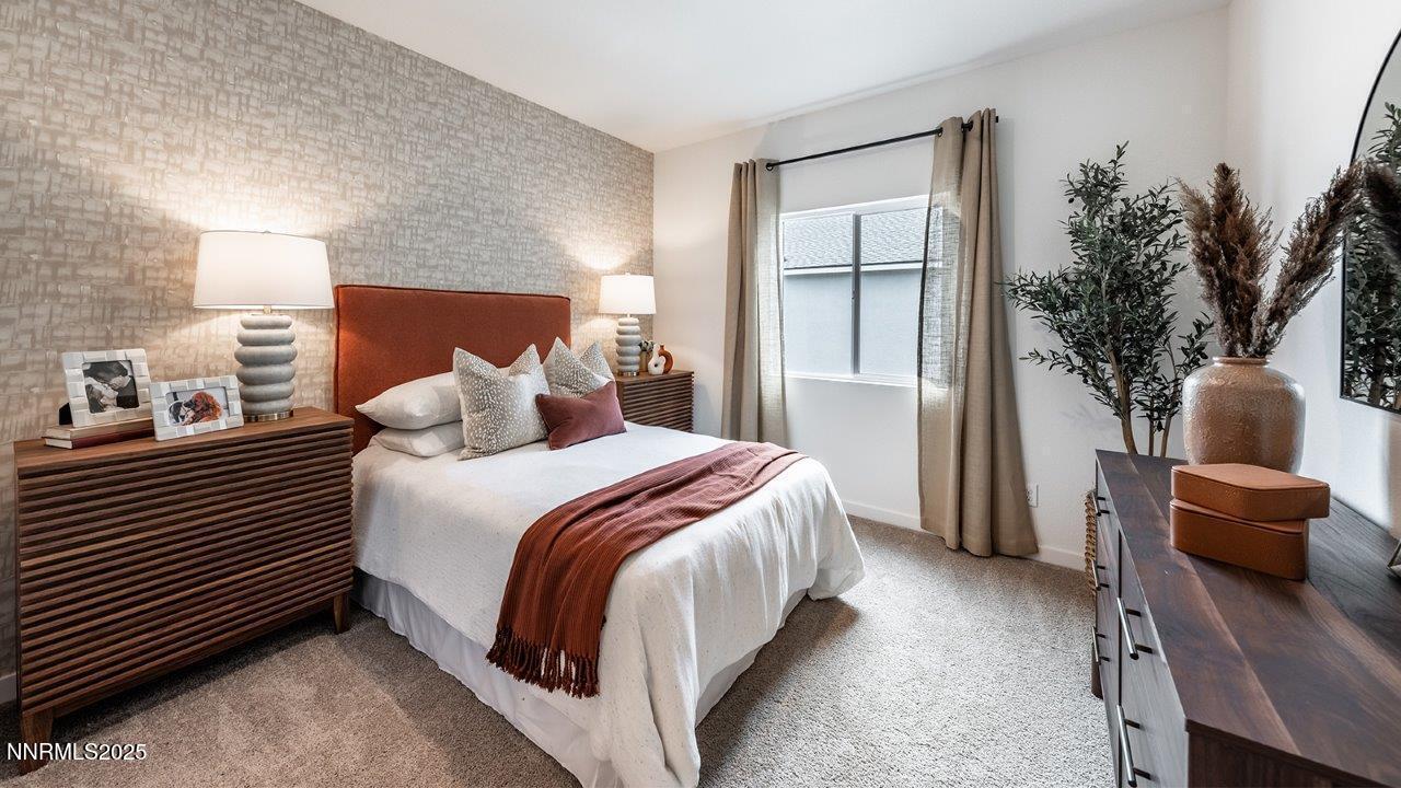 612 Union Road, Unit LOT #64 Dayton, NV 89403 - Photo 23 of 25 a bedroom with a bed and a couch