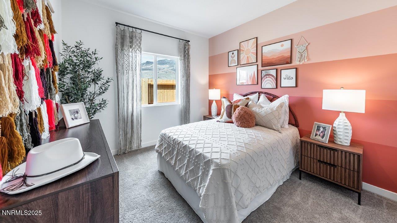 612 Union Road, Unit LOT #64 Dayton, NV 89403 - Photo 4 of 25 a bedroom with a bed and wooden floor