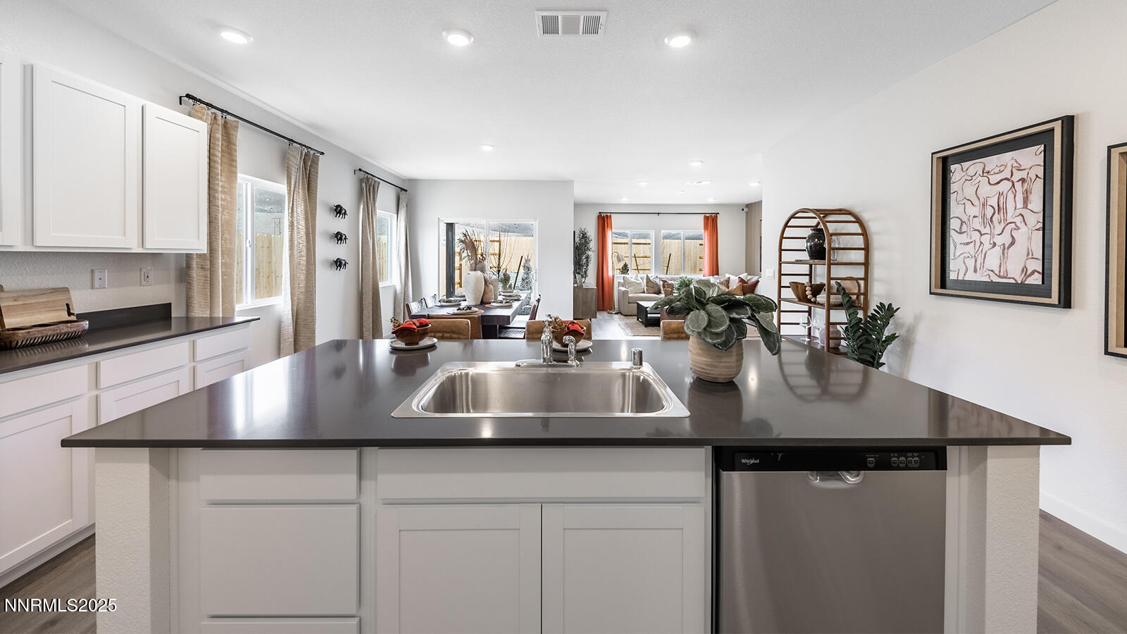612 Union Road, Unit LOT #64 Dayton, NV 89403 - Photo 9 of 25 a kitchen with kitchen island a sink and a view of living room