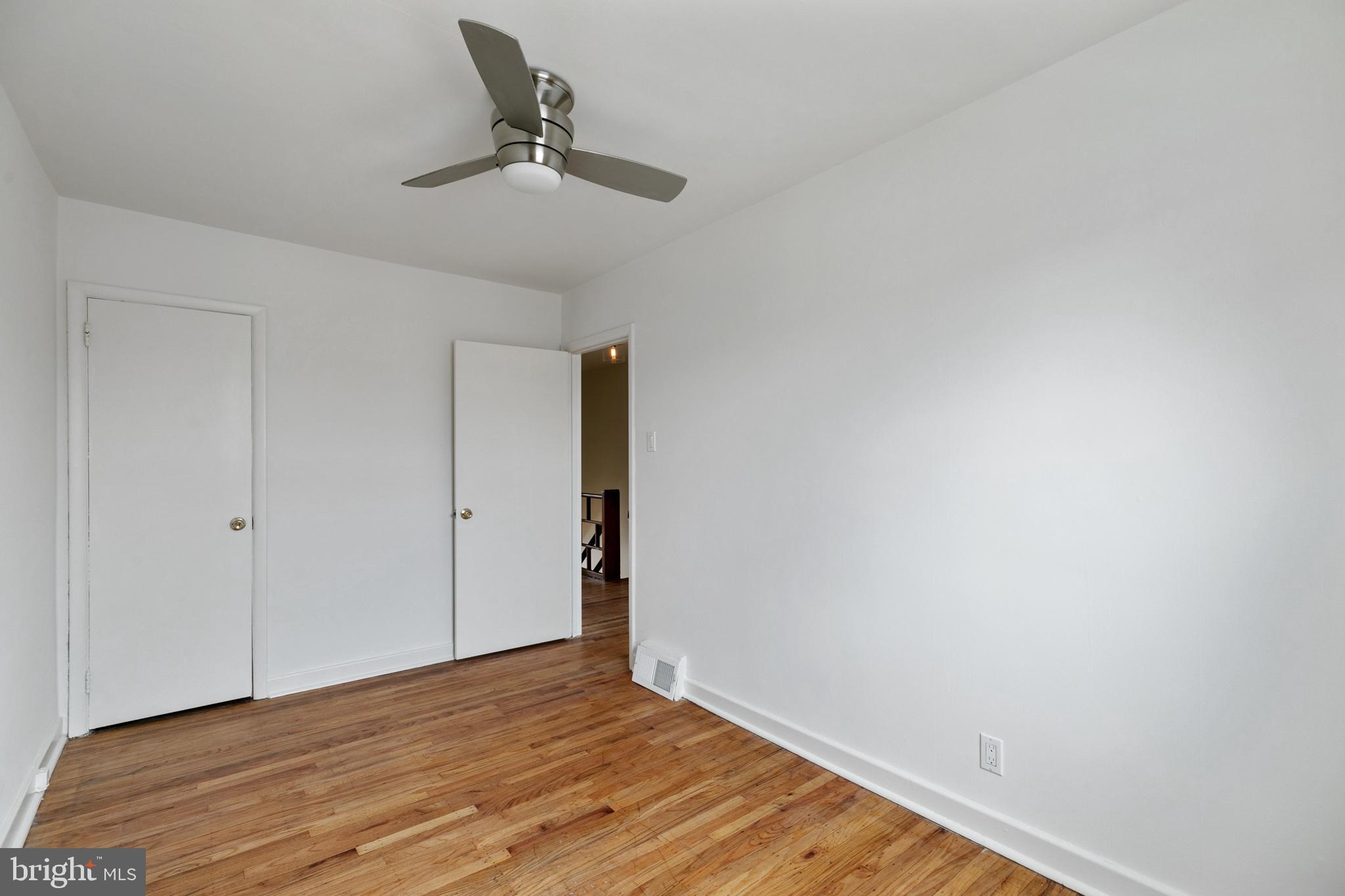 1828 South 29th Street Philadelphia, PA 19145 - Photo 21 of 32 a view of empty room with wooden floor