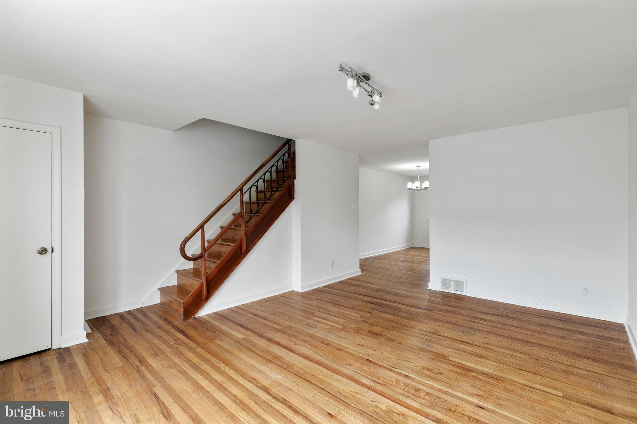 1828 South 29th Street Philadelphia, PA 19145 - Photo 3 of 32 a view of an empty room with wooden floor