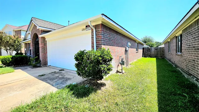 a front view of house with garden