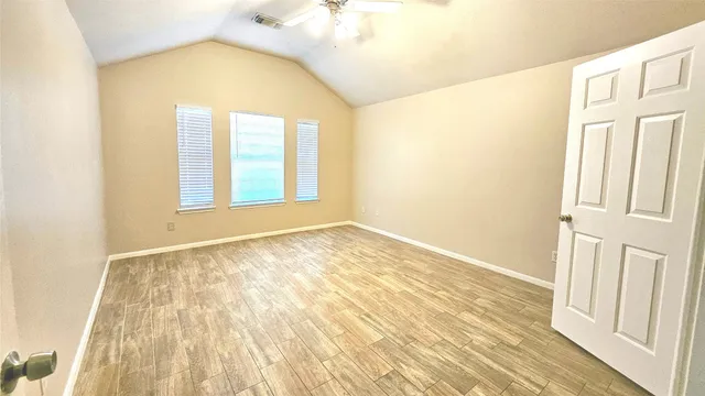 a view of an empty room and window