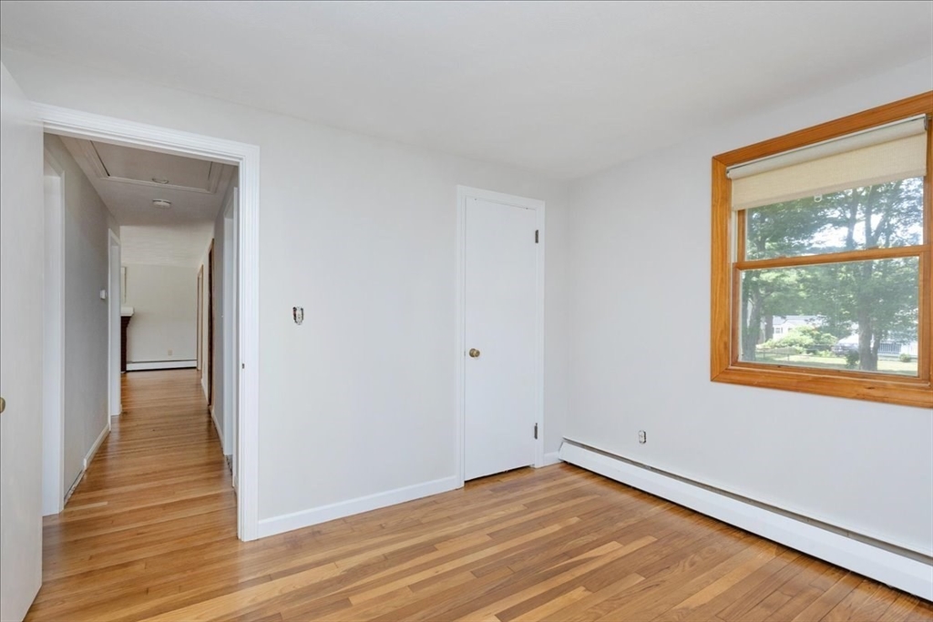 35 Rindone Street Holbrook, MA 02343 - Photo 27 of 37 a view of a room with wooden floor and window