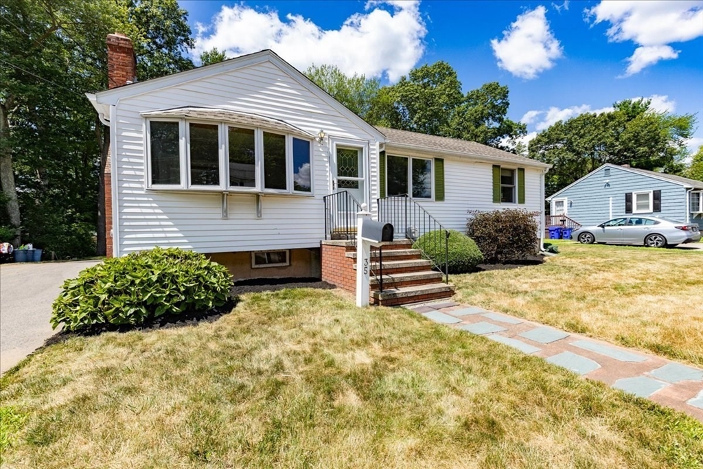 35 Rindone Street Holbrook, MA 02343 - Photo 4 of 37 a view of a house with a yard and sitting area