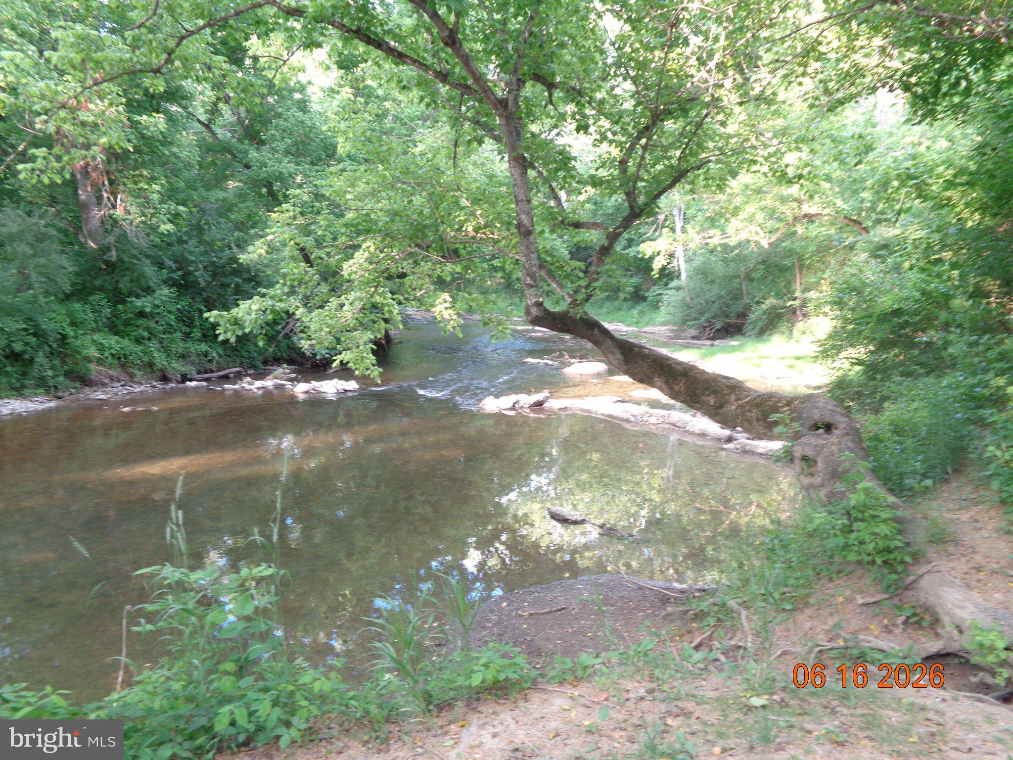 Lot 1 Martin Payne Road Kearneysville, WV 25430 - Photo 4 of 5 a view of a lake from a yard