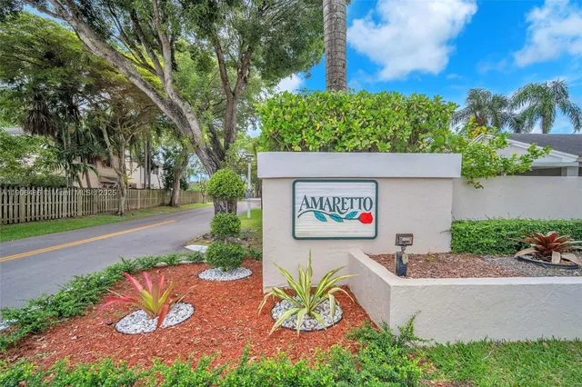 a view of swimming pool with a patio