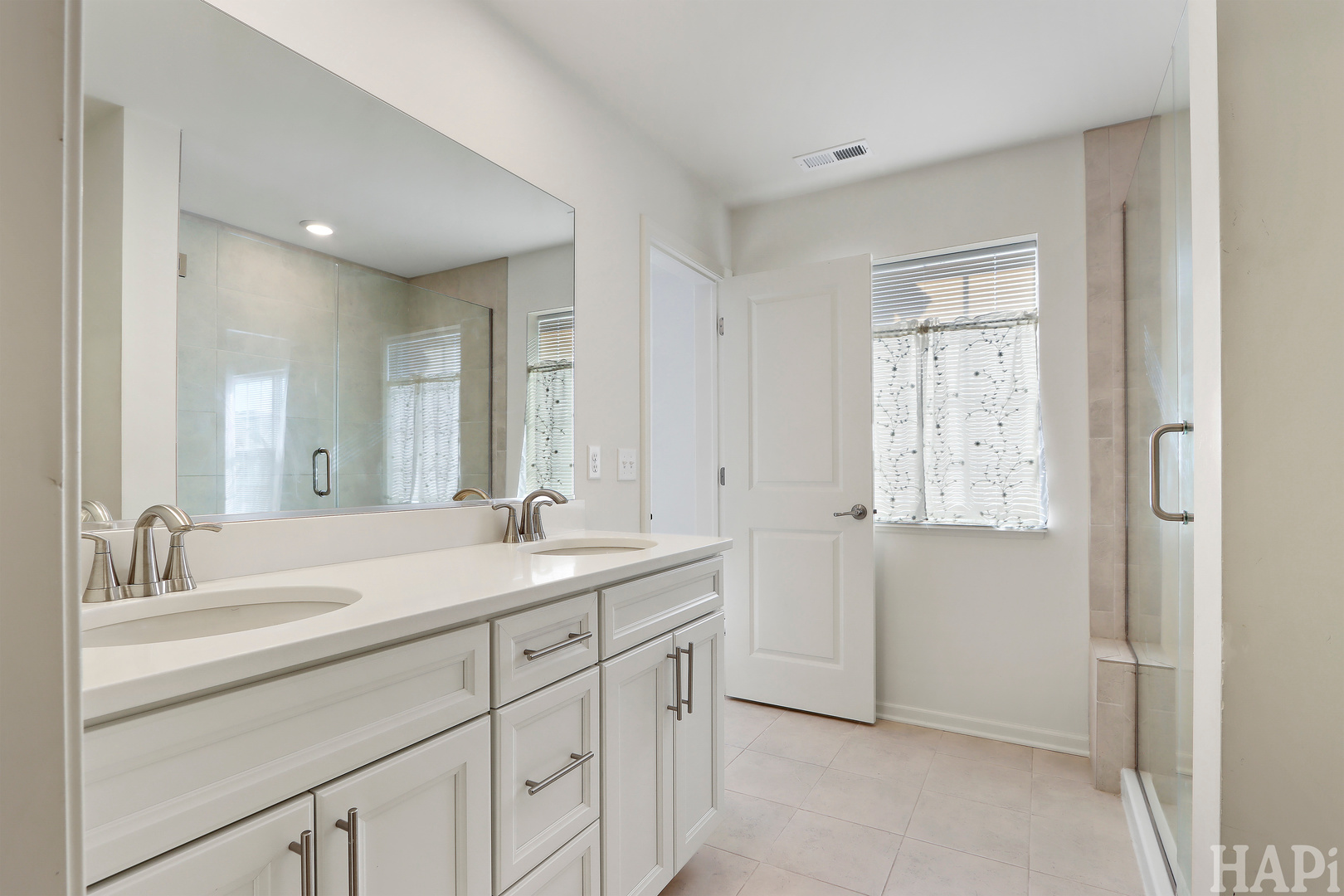 8426 Stillwater Road Wonder Lake, IL 60097 - Photo 20 of 32 a bathroom with a granite countertop sink mirror and double