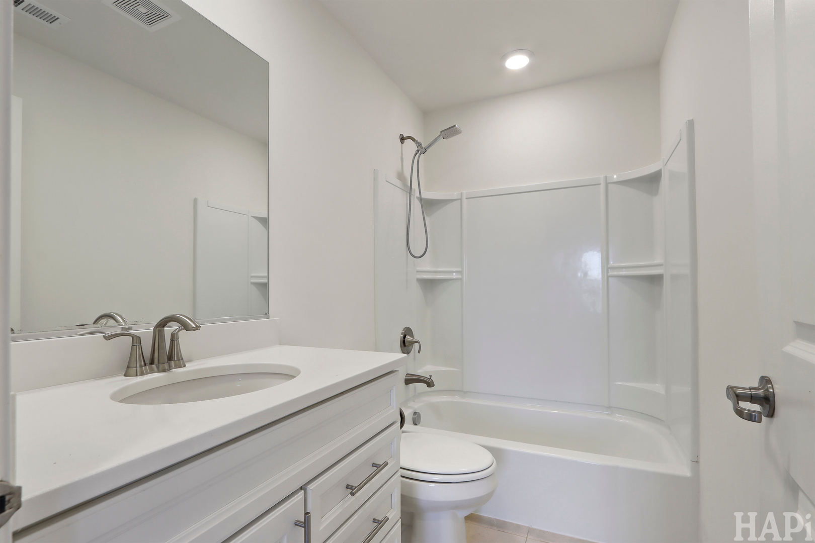 8426 Stillwater Road Wonder Lake, IL 60097 - Photo 22 of 32 a bathroom with a sink toilet vanity and shower