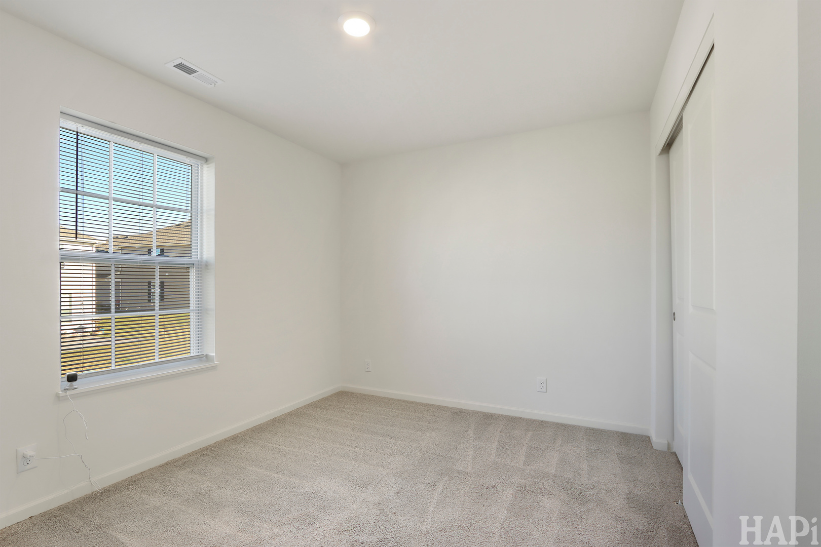8426 Stillwater Road Wonder Lake, IL 60097 - Photo 23 of 32 an empty room with windows