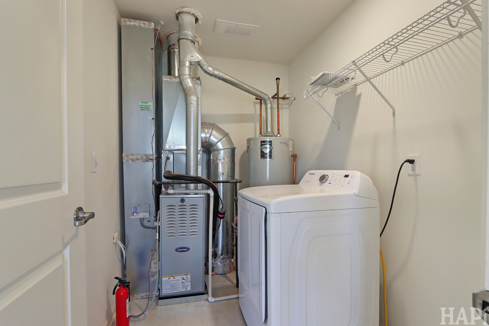 8426 Stillwater Road Wonder Lake, IL 60097 - Photo 26 of 32 a view of storage room with washer and dryer
