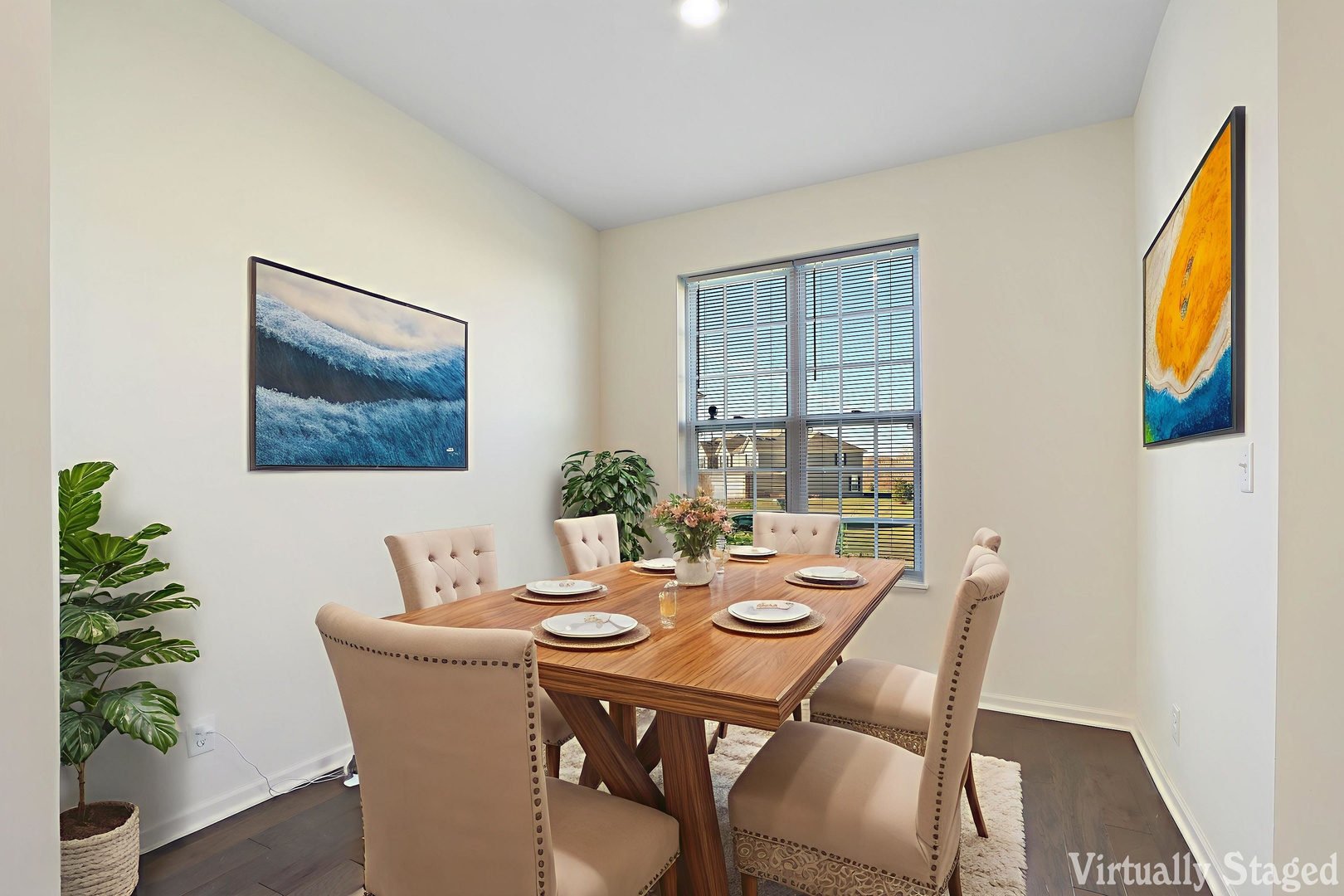 8426 Stillwater Road Wonder Lake, IL 60097 - Photo 4 of 32 a dining room with furniture potted plants and wooden floor