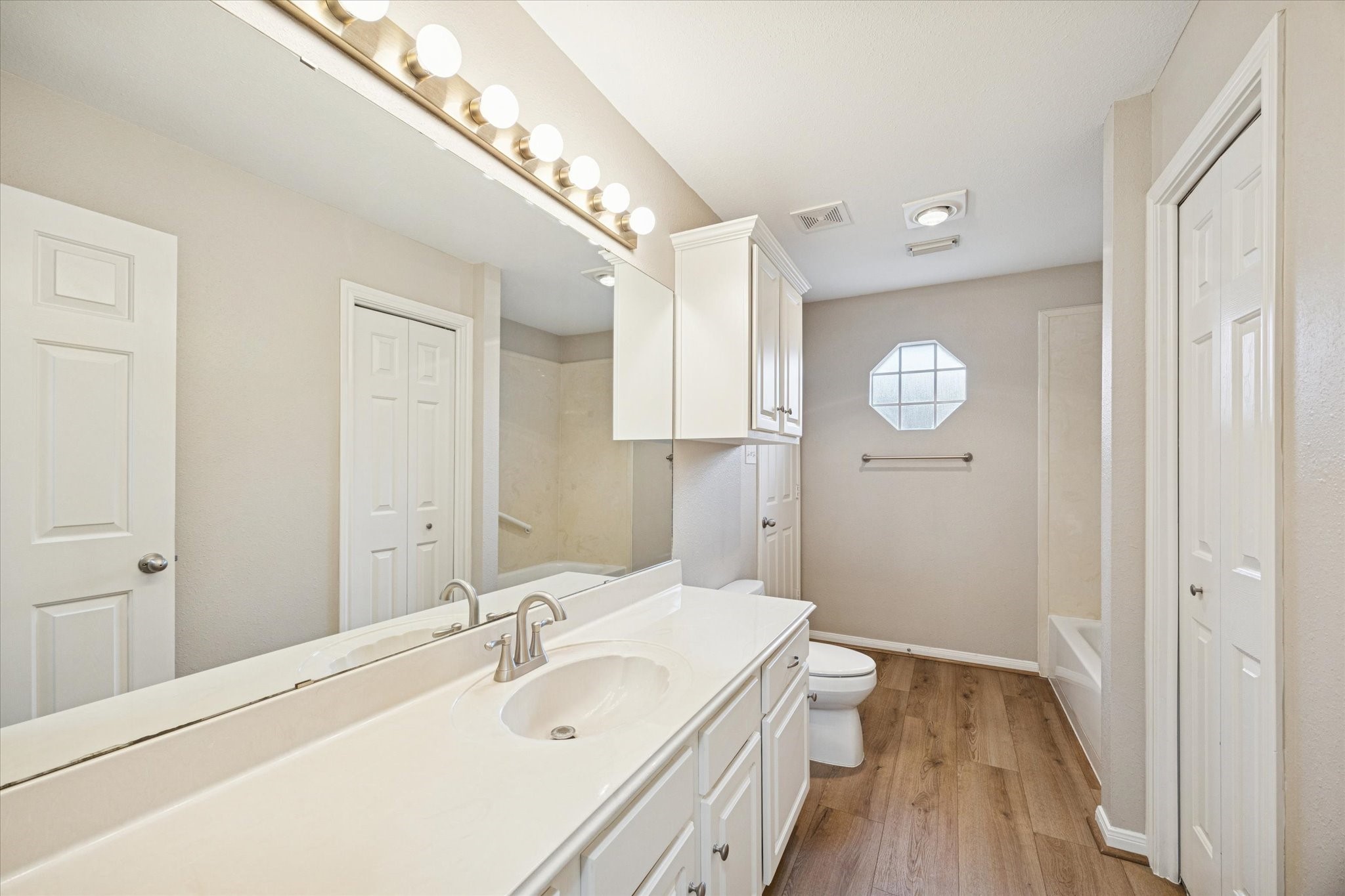 900 Eagle Lake Road Sealy, TX 77474 - Photo 12 of 15 a bathroom with a sink and a mirror