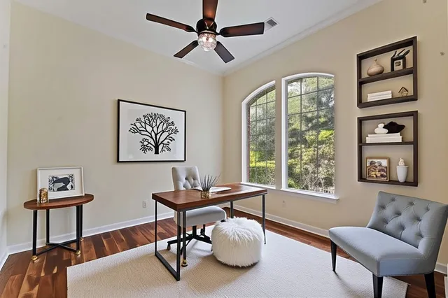 a workspace with furniture and window