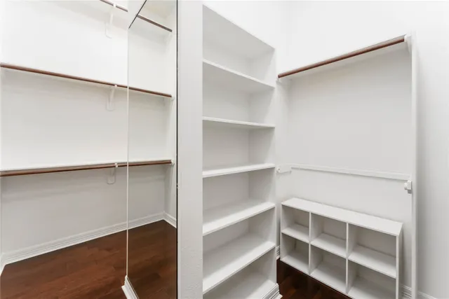 a view of an empty walk in closet