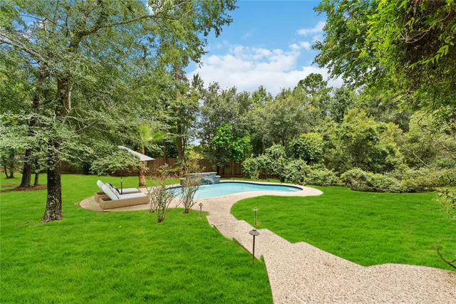 a view of a garden with trees