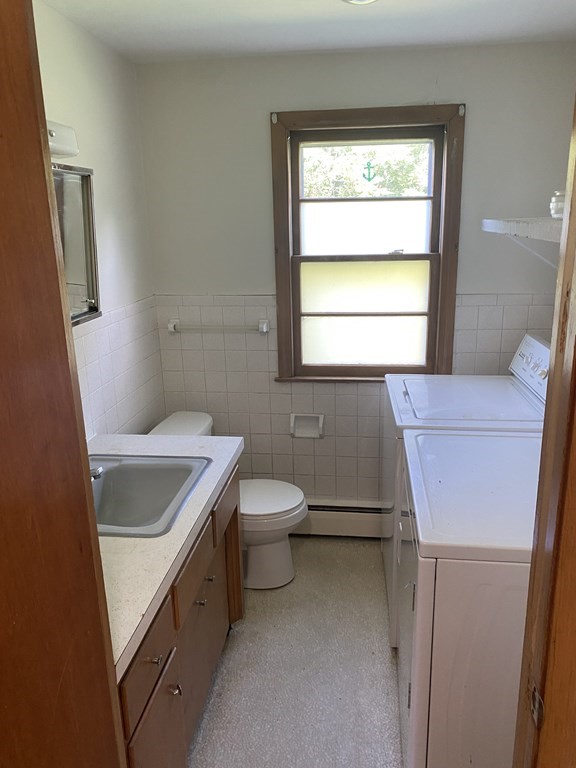 29 Justice Drive Amherst, MA 01002 - Photo 16 of 20 a bathroom with a sink toilet and window