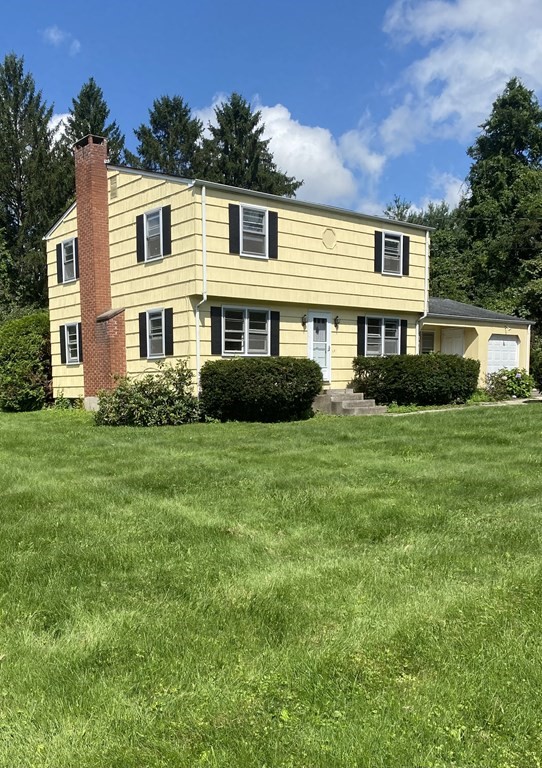 29 Justice Drive Amherst, MA 01002 - Photo 3 of 20 a front view of house with yard and green space