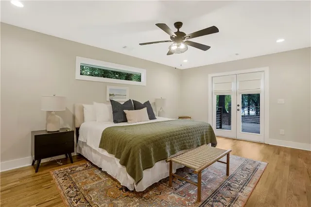 a bedroom with a bed and a view of bathroom