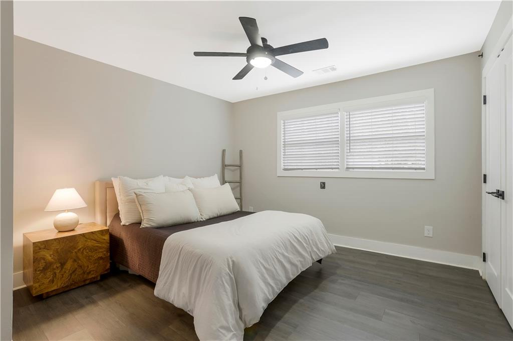 1344 Midlawn Drive Decatur, GA 30032 - Photo 27 of 43 a bedroom with a bed and a window