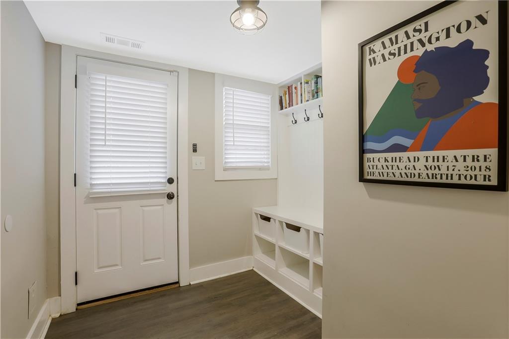 1344 Midlawn Drive Decatur, GA 30032 - Photo 29 of 43 a view of an entryway with wooden floor