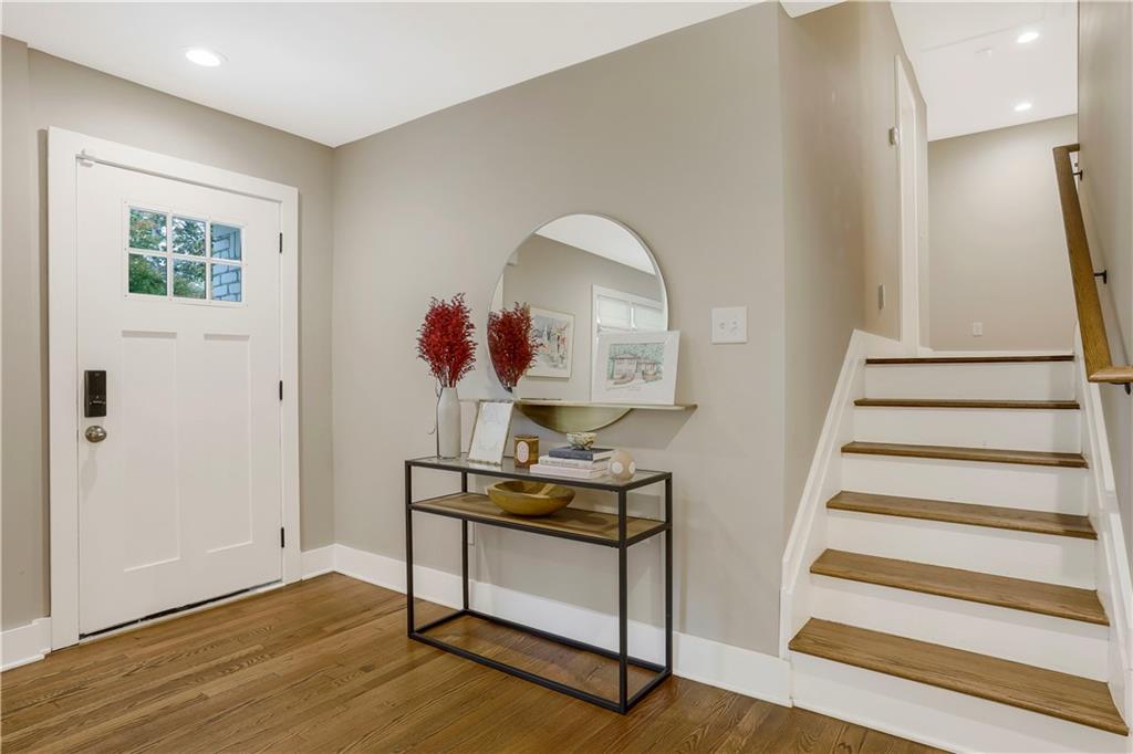 1344 Midlawn Drive Decatur, GA 30032 - Photo 4 of 43 a view of entryway with stairs and wooden floor